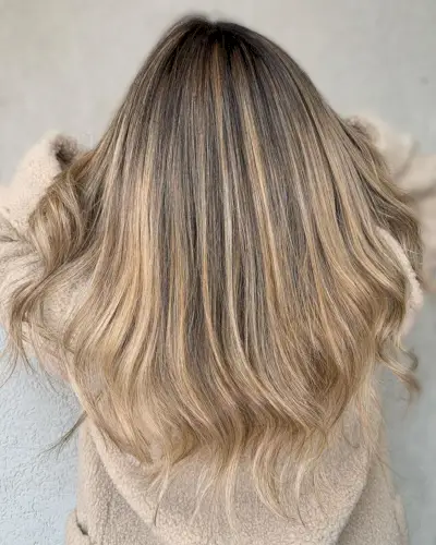 Gorgeous beige blonde highlights on dark brown hair