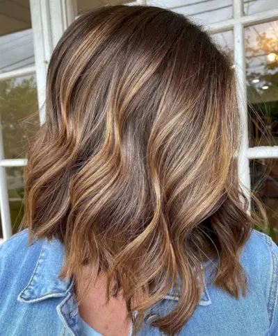 Chunky caramel highlights for dark, thin hair