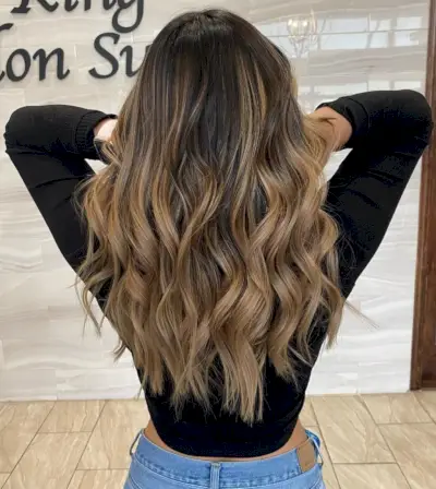 Rich brown hair with dark caramel balayage