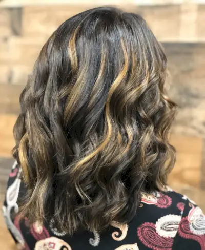 dark brown black hair with caramel highlights