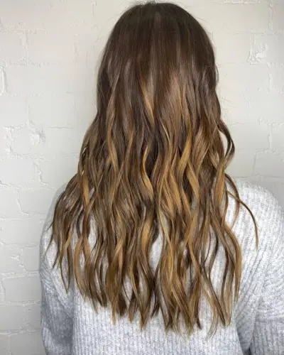 dark brown hair with caramel balayage highlights