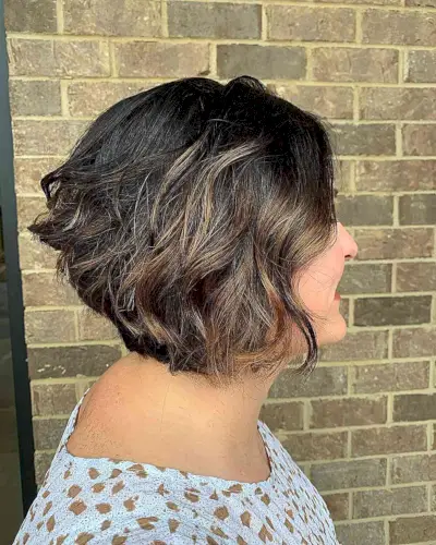 Short A-Line Dark Hair with Caramel Highlights and Textured Waves