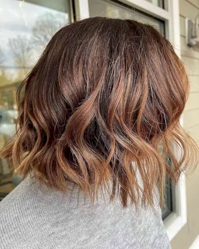 Subtle Balayage for a Short Caramel Brown Bob with Choppy Ends