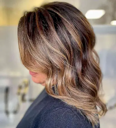 Mid-Length Chestnut Brown Hair with Caramel Face-Framing Highlights and Layers