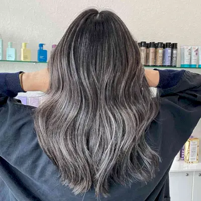 Subtle Silver Balayage Highlights on Medium Black Hair
