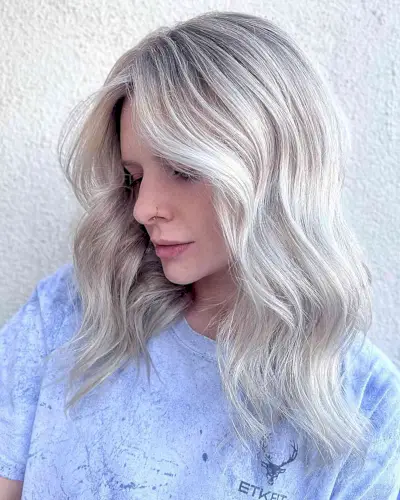 Shadow-Rooted Platinum Hair with Wispy Layers and Soft Waves