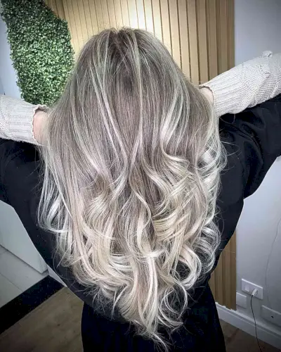 Contrasting Platinum Highlights on Dark Blonde Hair