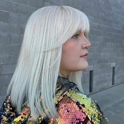 Blunt Mid-Length Platinum Cut with Fringe and Layers