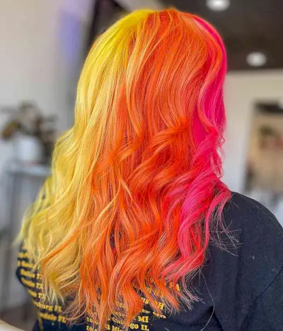 Yellow-Orange-Pink Sunset Split Dye Hair Color with Waves