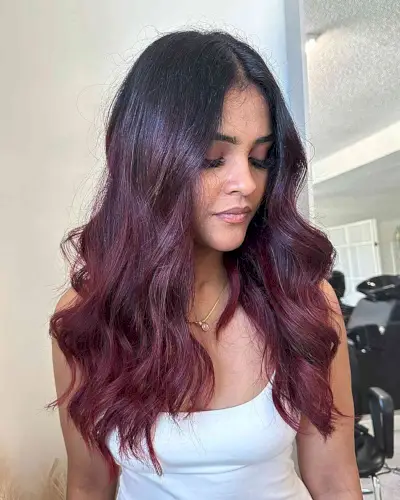 Muted Burgundy Balayage Long Waves with Middle Part