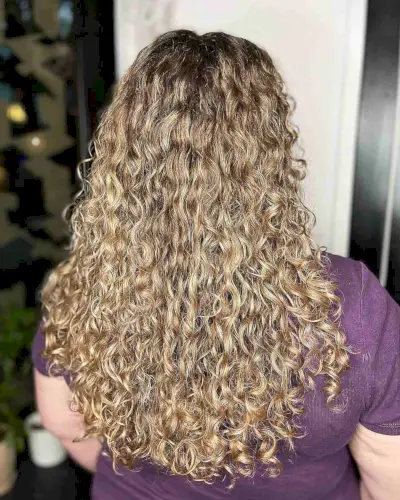 Hand-Painted Honey Blonde Balayage with Long Curls