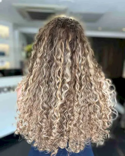 Very Long Sandy Blonde Balayage Curly Hair