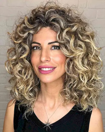 Beautiful Dirty Blonde Balayage for Curls