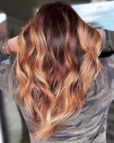 copper red with subtle caramel balayage highlights 