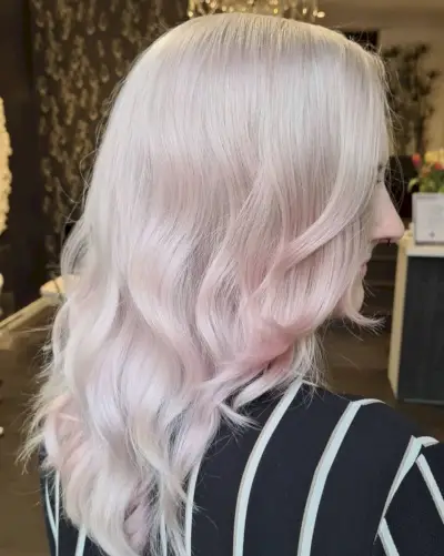 Hints of pink on white blonde hair