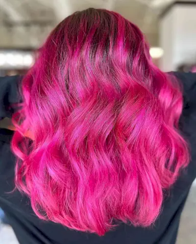 Neon Pink Balayage Hair for girls with long wavy hair