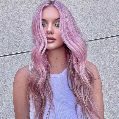 The Prettiest Pink Long Hair with Waves and a Center Part with Dark roots