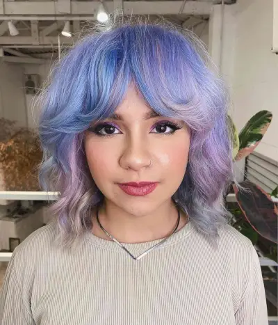 Short Fluffy Purple-Blue Bob with Curtain Bangs