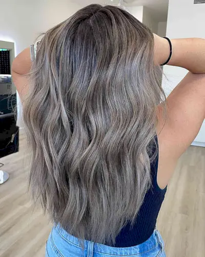 Dark Ashy Blonde Balayage for long wavy hair