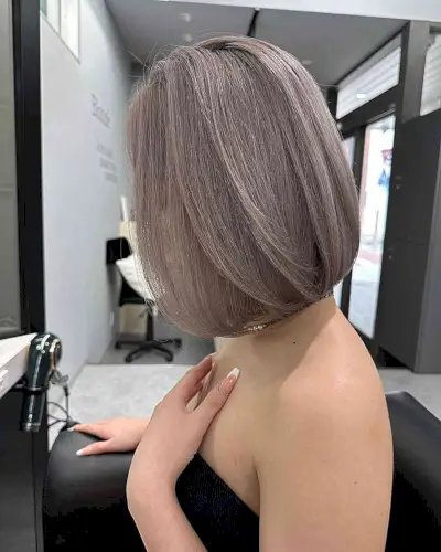 Grayish Ash Blonde Balayage for ladies with short straight hair