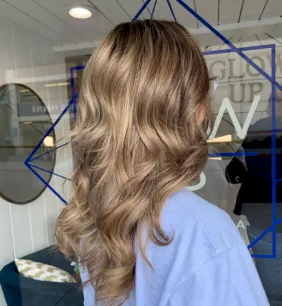 Ash blonde balayage on caramel hair