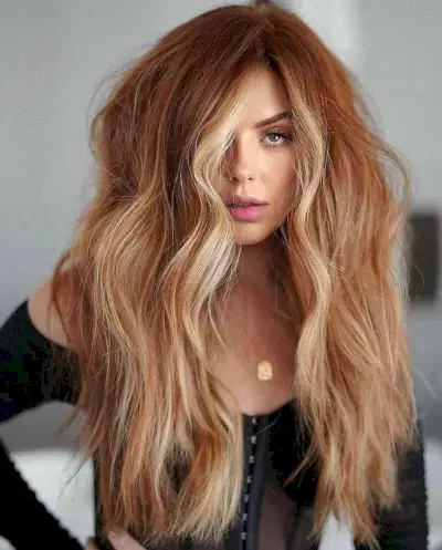 Coppery Long Fluffy Hairstyle with a Blonde Money Piece