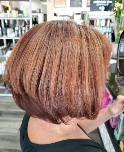 caramel and copper tones fall hair color for old lady