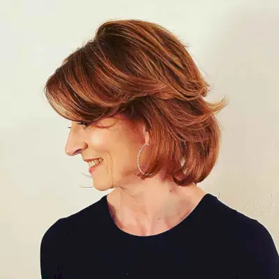 burnt orange and copper balayage fall hair for older women