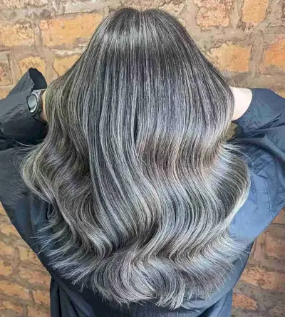 Ash Grey Balayage Babylights with medium-length Big Waves