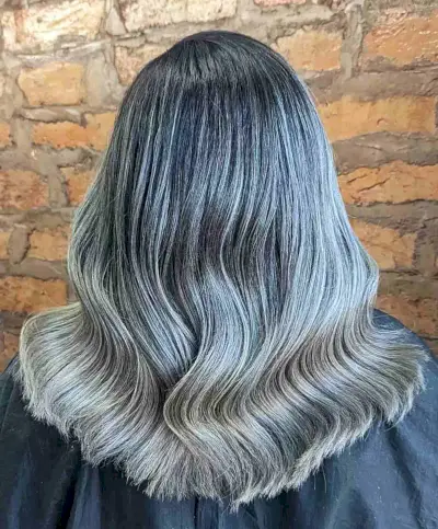 Silver Blonde Tips on Mid-Length Dark Wavy Hair Grey Balayage