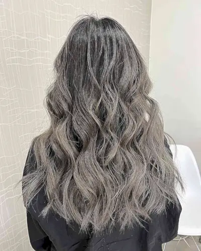 Dark Muted Grey Balayage Highlights on Long Dark Wavy Hair