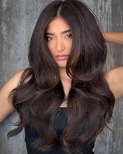 Amazing Long Thick Dark Brunette Hair with Highlights and a middle part for ladies