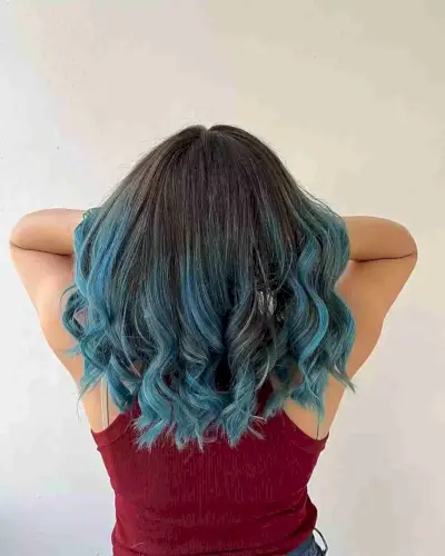 Brunette Balayage with Saturated Blue Tips on Curled Medium Hair
