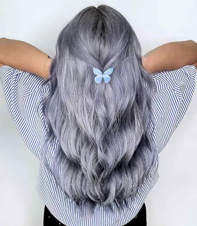 Blended Silver and Blue Balayage Tones for Long-Length Wavy Hair