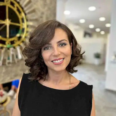 Short Brunette Hair with a Side Part and Long Bangs