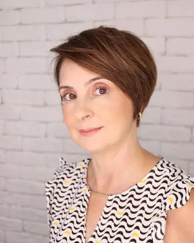 very short medium brown pixie cut