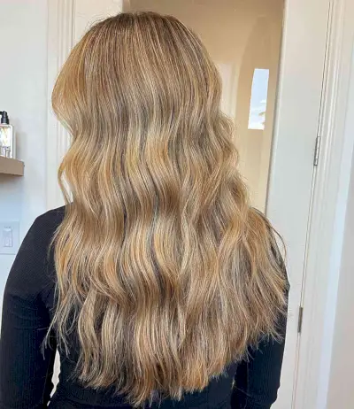 Ash Honey Blonde Babylights on Long Wavy Hair
