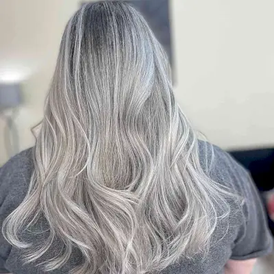 Mid Back-Length Icy Grey Blonde Balayage Hair with Dark Roots