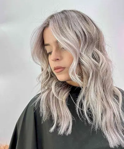 Medium to Long Frosted Icy Blonde Balayage Hair with Layered Waves