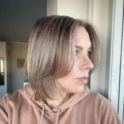 Sandy Ash Dishwater Blonde with Dark Roots