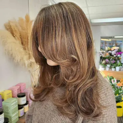 Warm Caramel Highlights on Mid-Length Dark Hair