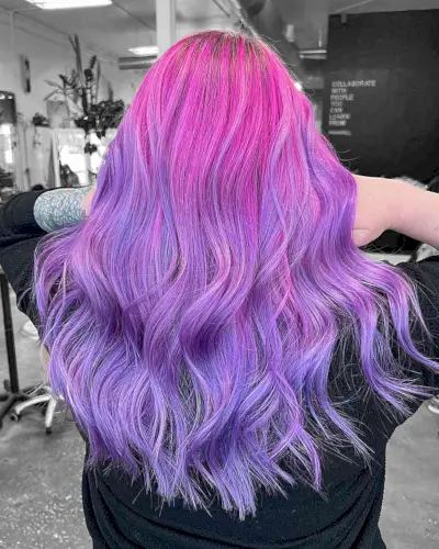 Stunning Pink to Purple Ombre for women with long wavy hair