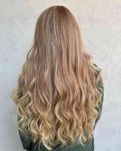 Natural Strawberry Blonde with Sun-Kissed Highlights