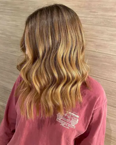 Golden Honey Strawberry Blonde Balayage with Dark Roots