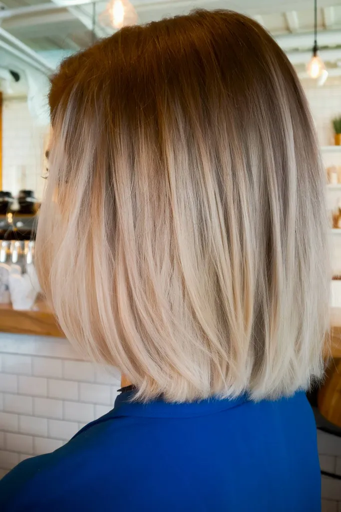 Cabelo ombre loiro de inverno com textura ondulada' title=