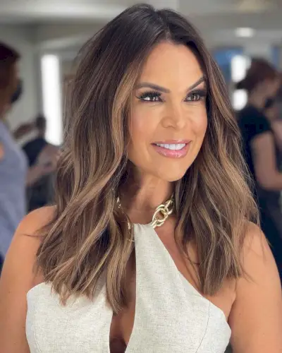 warm brown hair with caramel highlights