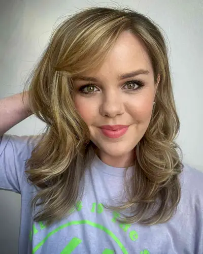 Medium-Length Dimensional Blonde Balayage Layered Hair with Side Bangs