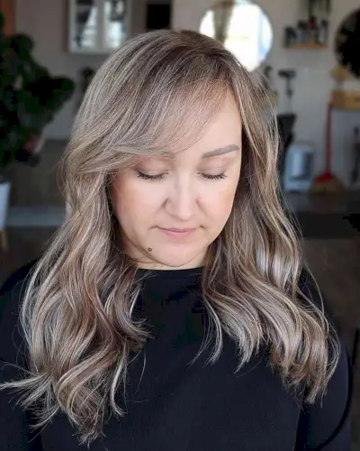 Medium Layered Mushroom Bronde Balayage Hair with Side-Swept Bangs