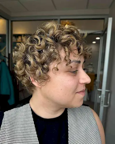 Ear-Length Curly Hair Blonde Balayage with Curly Fringe