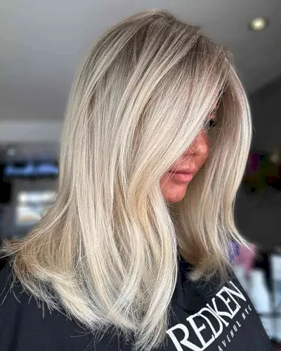 Dark-Rooted Light Ash Barbie Blonde with Shoulder-Length Cut